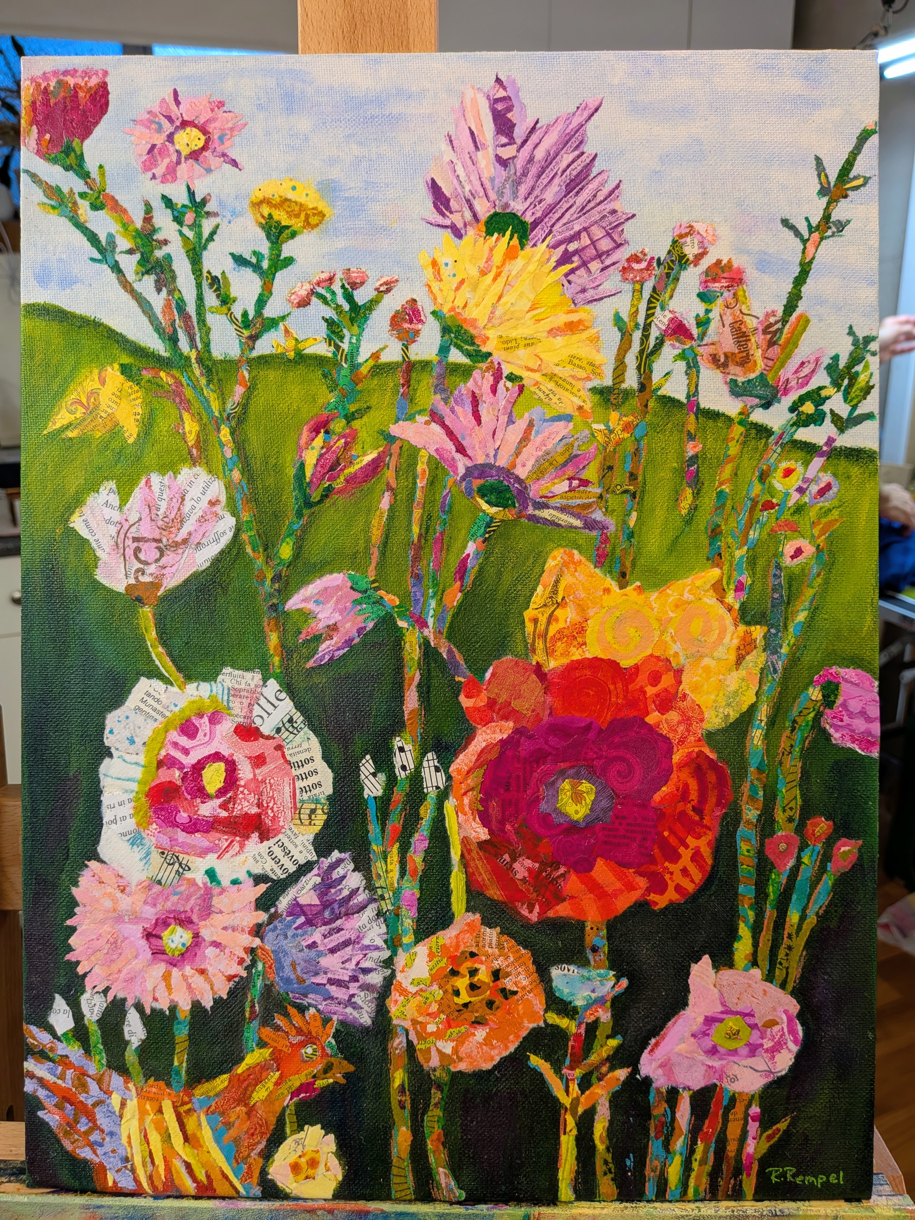Collage bouquet of wildflowers bursting with magenta and yellow petals